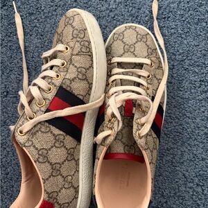 Gucci Beige Sneakers with Red and Black Accents